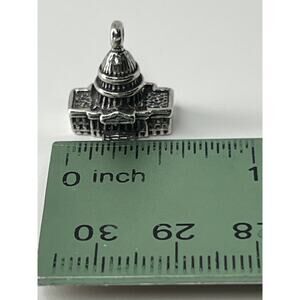 Sterling silver charm, marked 925